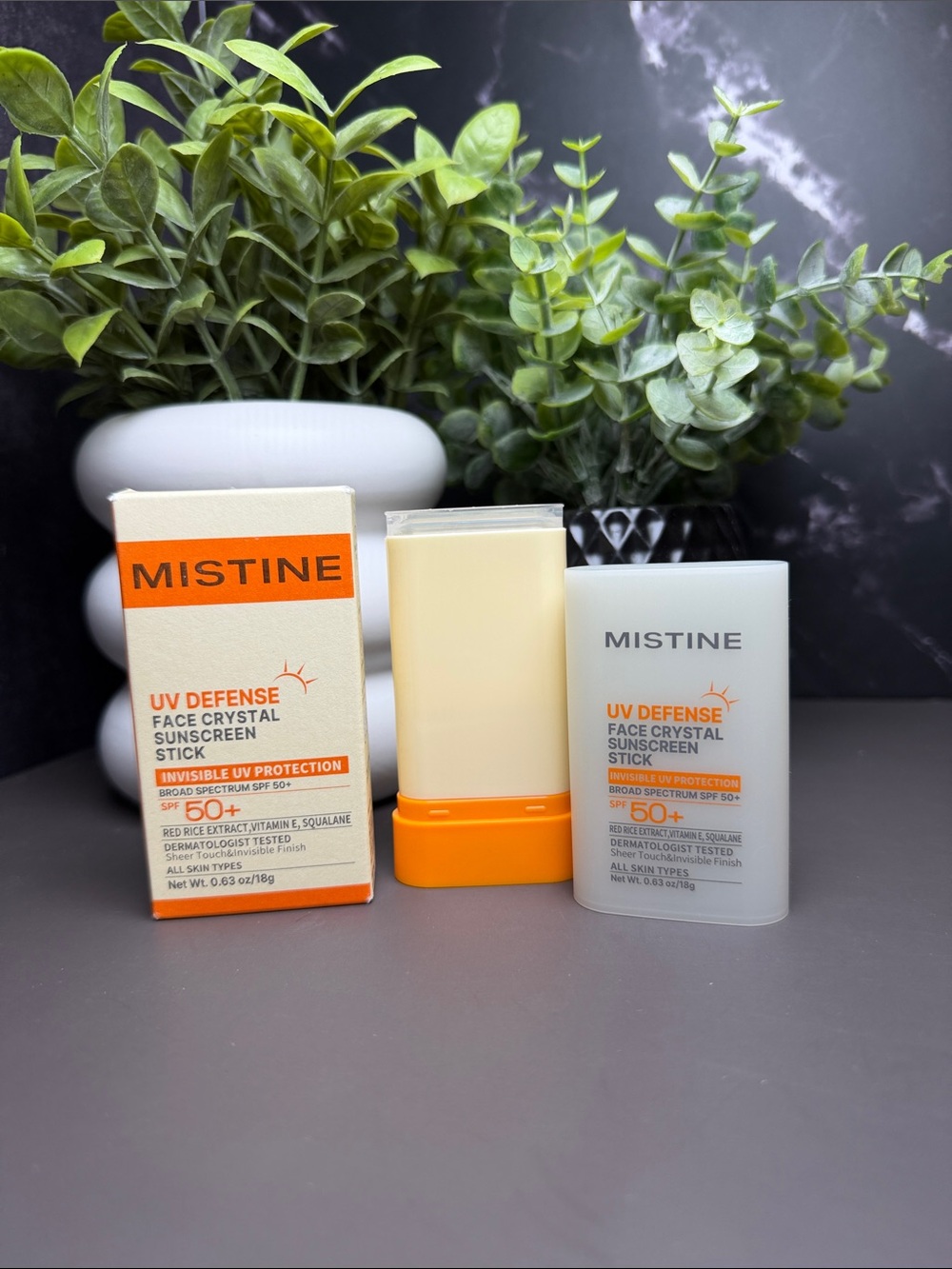 UV Defense Face Crystal Sunscreen Stick SPF 50+ — White & Orange